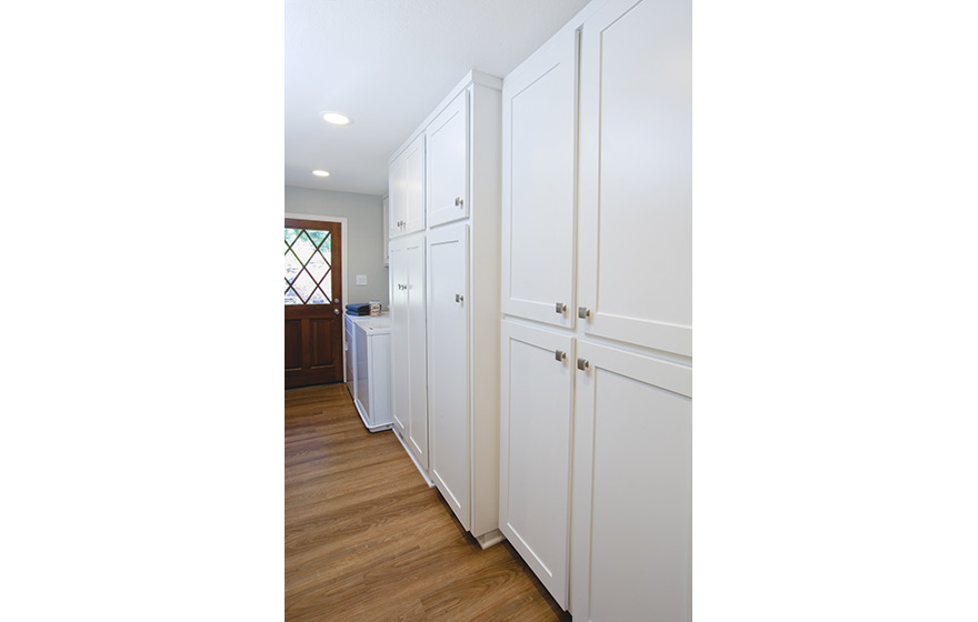 A fresh look and opened up layout shine in this refaced kitchen. 