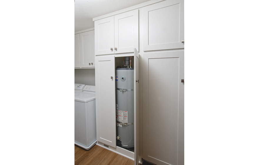 A fresh look and opened up layout shine in this refaced kitchen. 