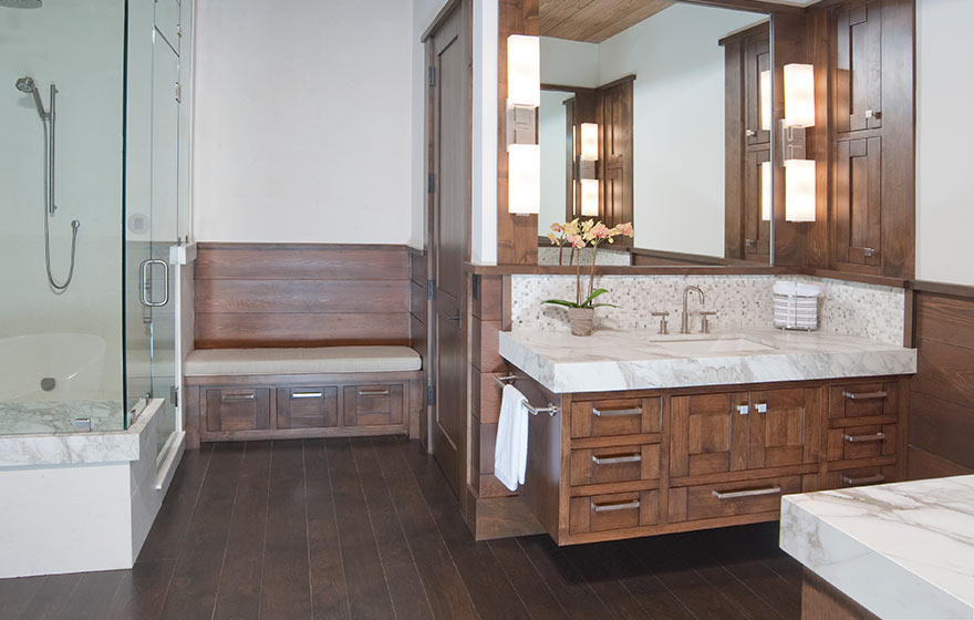 A tranquil space tucked into this mountain retreat brings in the natural warmth of the wooded surroundings with Alder cabinet doors.