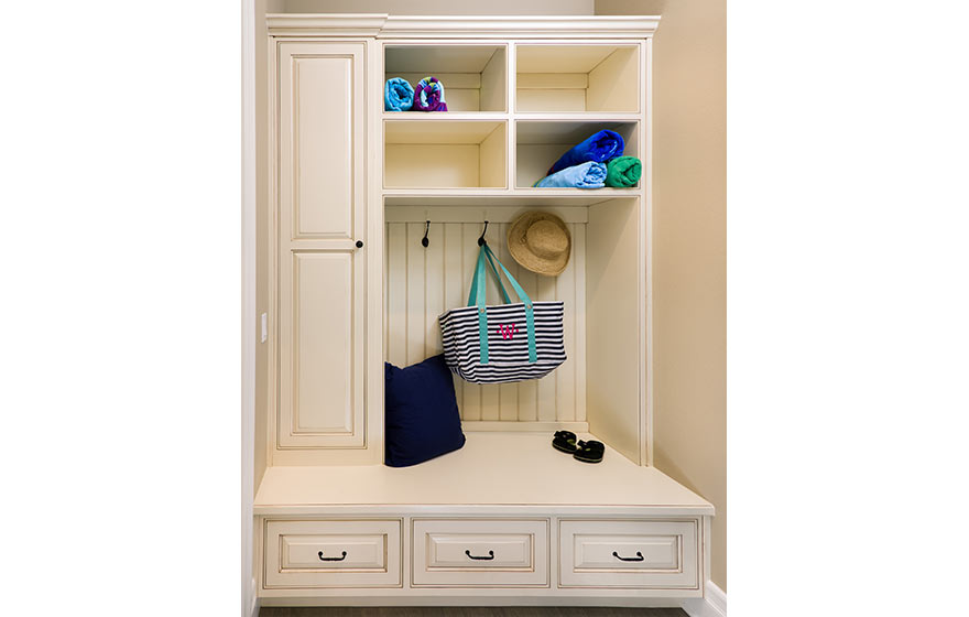 Organize the daily chaos with an eye-catching built-in mudroom cabinet.