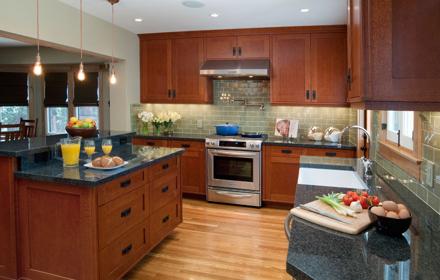 Craftsman style kitchen with Shaker 3/4" (831) Doors with a modified 3" frame in Quarter Sawn Red Oak using Streamline® RTA Cabinet Components.