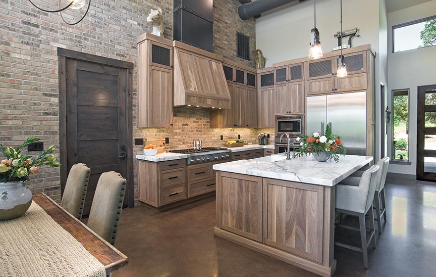 Rough Sawn distressing with the natural variations of walnut add depth to this gorgeous space