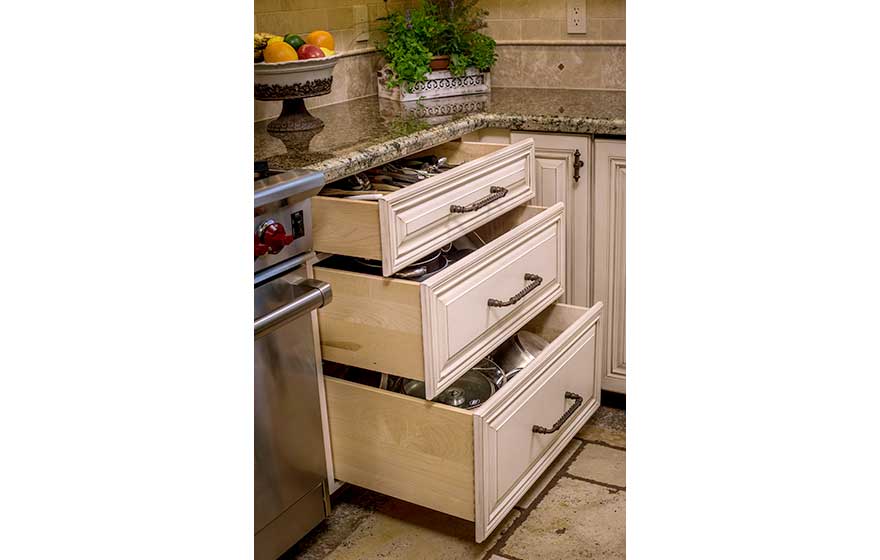 This elegant kitchen with glaze detail paint is the perfect place to enjoy your morning cup of coffee.