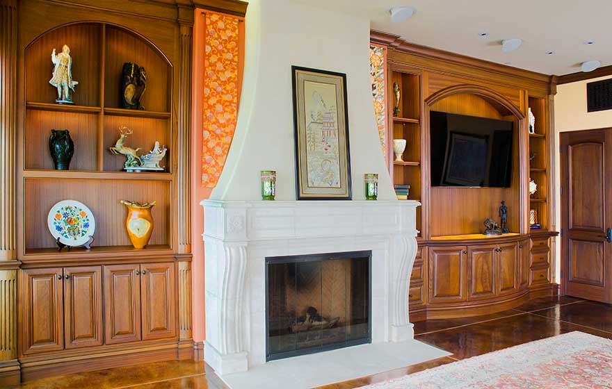 The Ponderosa 3/4" (839) doors' curves highlight the beautiful natural color and grain of the Sapele material in this custom living room. 